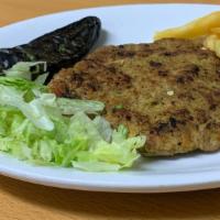 Chapli Kabab · Patty made with minced chicken mixed with onion, tomato, green chilies, coriander seeds, cum...