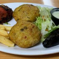 Aloo Tikki Platter · Finely ground potato patties with herbs and spices served with chutney (red sauce).