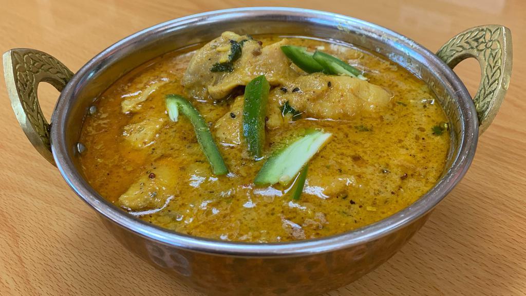 Chicken Achari · Chicken cooked with authentic Pickle spices.