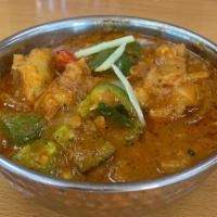 Chicken Jalfrezi · Boneless chicken cooked with fresh ground spices sauteed with tomato, bell peppers, onion, g...