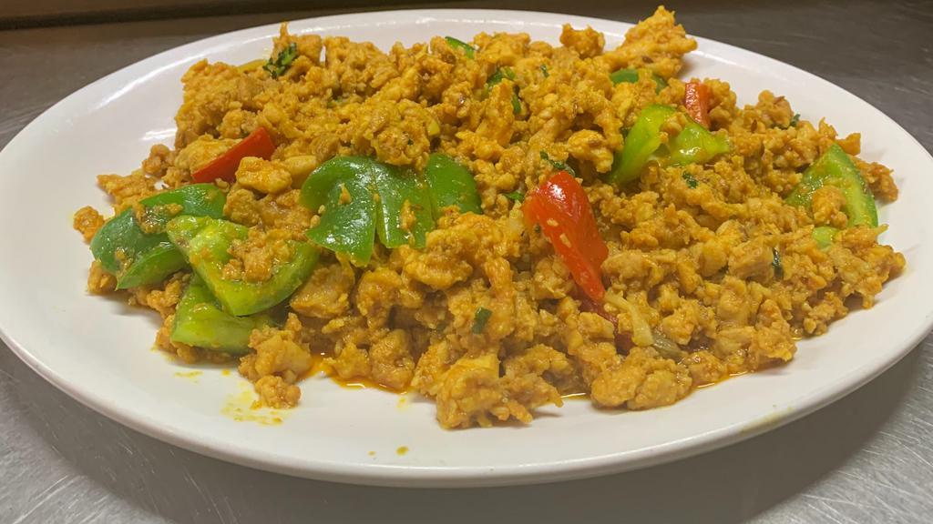 Chicken Keema  · Ground chicken cooked with onions,Spices, red and green peppers with tomatoes.