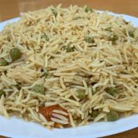 Muttar Pulao · Basmati rice cooked with green peas.
