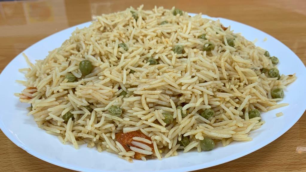 Muttar Pulao · Basmati rice cooked with green peas.
