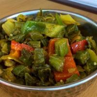 Bhindi Masala · Fresh okra cooked in onions, tomatoes, herbs and spices.