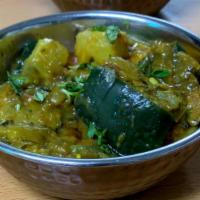 Aloo Baingan · Eggplant and potates cooked with spices and tomatoes