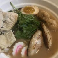 Chicken Shoyu Ramen · Clear chicken broth, shoyu tare topped with pork chashu, chicken, wood ear mushrooms, bean s...