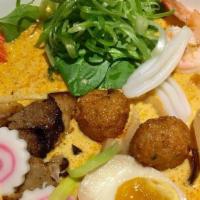 Seafood Curry Ramen · Special homemade creamy curry broth. Topped with shrimp, squid, homemade fish balls and pork...