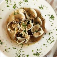 Zuppa De Clams · A dozen little neck clams sauteed in a white wine, garlic and fresh basil sauce.