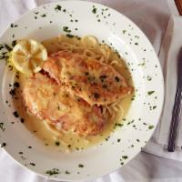 Chicken Francaise · Lightly egg-battered sauteed in a white wine, lemon and butter sauce. Served over linguine.