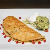 Quesadillas · Flour tortilla stuffed with pico de gallo and melted cheese.