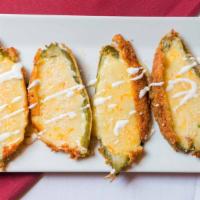 Jalapeno Poppers · Jalapeno poppers stuffed with cheese, breaded and deep-fried.