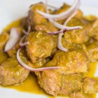 Carnitas De Puerco · Chunks of pork shoulder cooked in slowly with orange juice,. served in your choice of sauce....