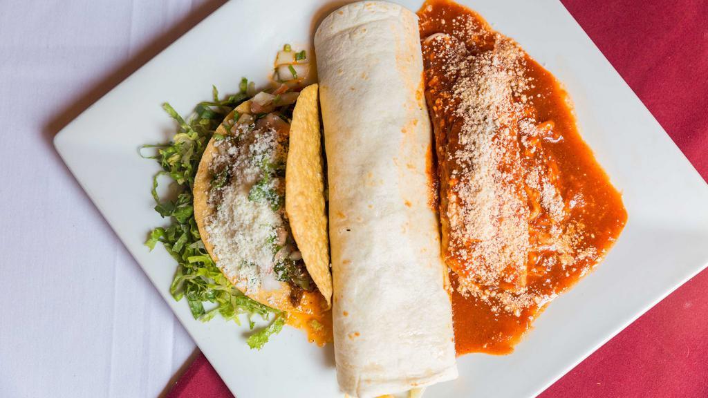 Combo Mexicano · Enchilada, burrito and hard taco, choice of filling.