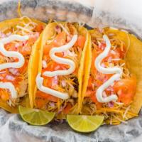 Loaded Tacos · Three (3) soft corn tortillas stuffed with chicken, green sauce, Monterey Jack & cheddar che...