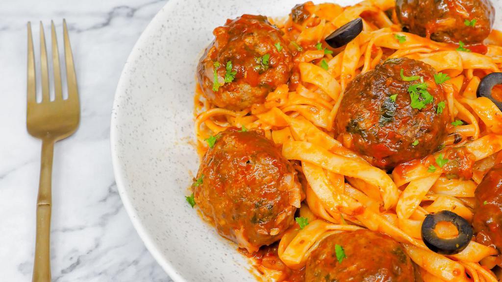 Linguine Meatballs · Linguine with marinara meatballs, sautéed mushrooms, topped with tomato sauce and parmesan cheese.
