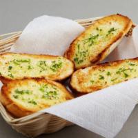 Garlic Bread · Homemade bread topped with garlic and olive oil.