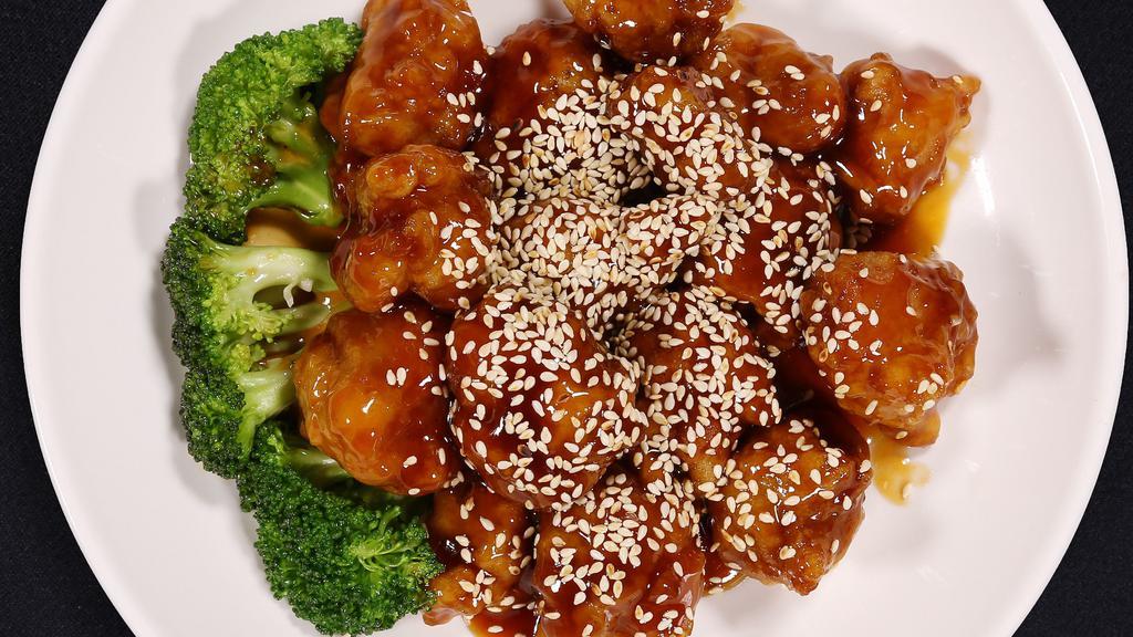 Sesame Chicken · Served with rice.