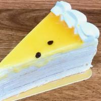 Passion Fruit Mille Crêpe Cake · Hand-made thin layer Vanilla Crêpe; filled with sweet and sour passion fruit blended fresh c...