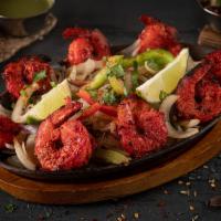 Tandoori Shrimp · Shrimp marinated in yogurt sauce, spices and grilled to perfection.