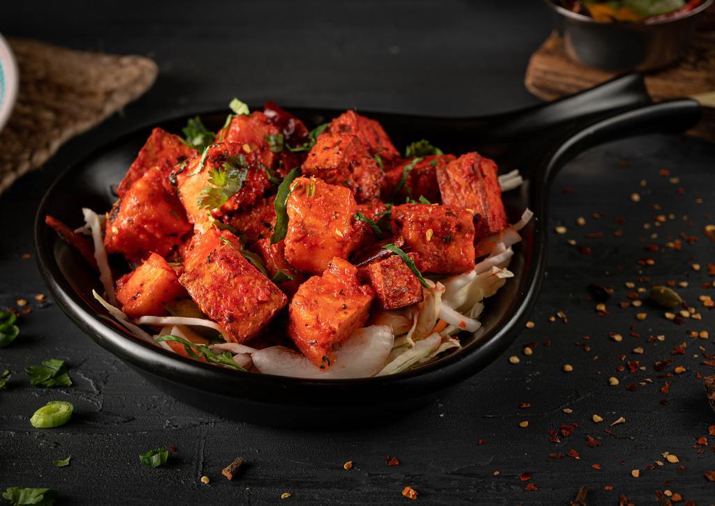 Paneer 65 · Since it's introduction in 1965 this unique dish made with ginger, cayenne pepper and lime, has been favorite to many.