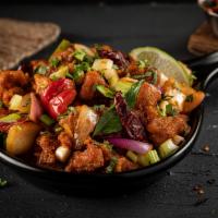 Chili Chicken · Chicken cubes tossed with spices and herbs with an indo chinese flavor