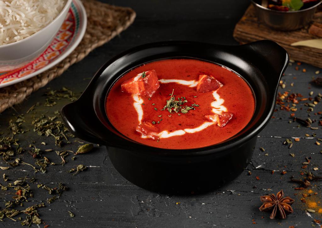 Paneer Butter Masala · Home-made Indian cheese cubes cooked in creamy tomato sauce, butter and lightly spiced and sweetened.