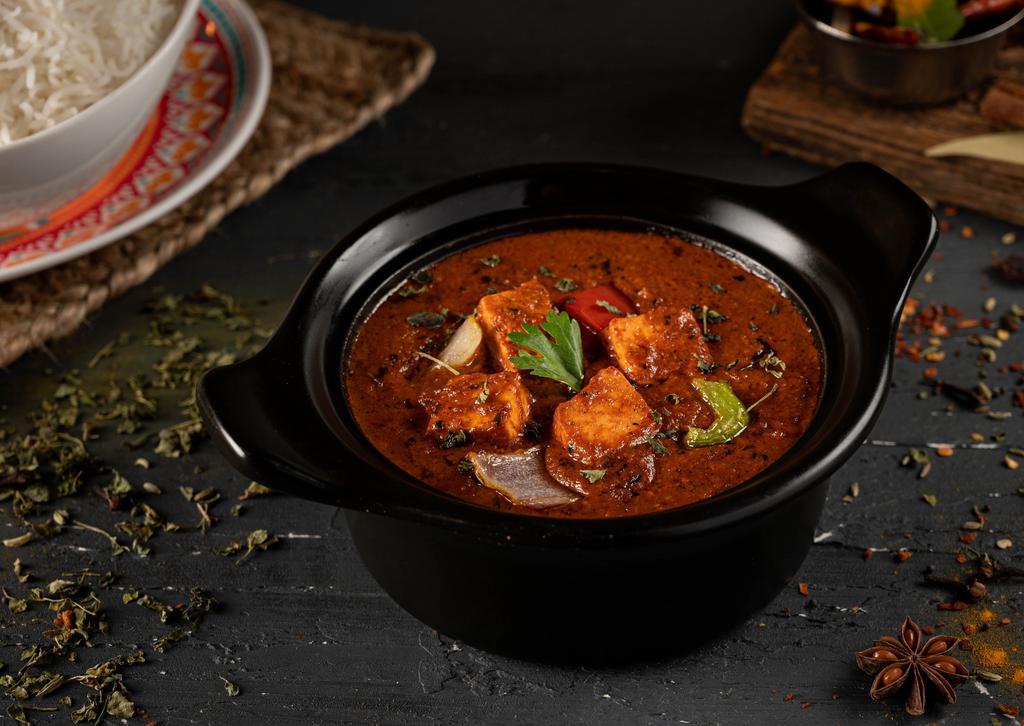 Paneer Tikka Masala · Home-made Indian cheese cubes cooked in creamy tomato sauce, lightly sweetened and spiced.