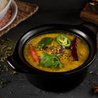 Paradise Dal Fry · Our special dal fry is well cooked dal with cumin seeds, green/red chilies, onions and a tou...