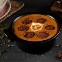 Malai Kofta · Home-made vegetable and cheese croquettes simmered in mint flavored cream sauce, then mildly...