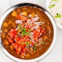Chana Masala · A combination of whole chickpea in onions and tomato sauce with spices.