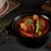 Chicken Vindaloo · Cubed chicken pieces cooked with spicy chilli sauce