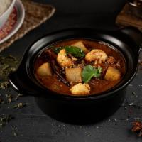 Aloo Gobi · Cauliflower florets and cubed potatoes cooked in aromatic spices with onions and tomatoes