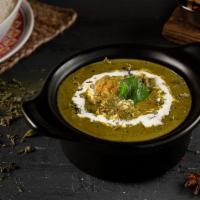 Chicken Saag · Chicken cooked with onions and spinach base to produce a creamy and delicious dish.