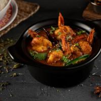 Shrimp Curry · This very notable Indian food flavored with coriander powder, cumin, black pepper and turmer...