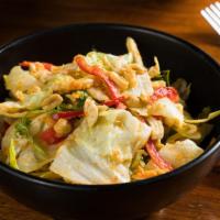 Chinatown Salad · Shredded chicken, iceberg lettuce, peanut cilantro & ginger carrot dressing