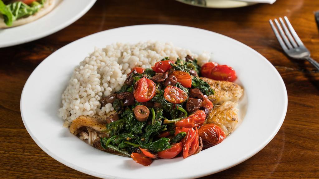 Spicy Fish Sautee · Seared tilapia with pan roasted tomato, black olive & red pepper