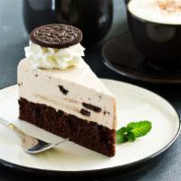Oreo Cheesecake · A rich and creamy New York-style cheesecake baked with Oreos inside a honey-graham crust.