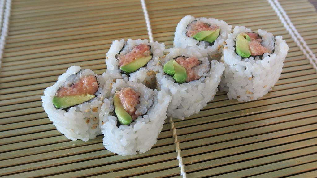 Spicy Ahi Roll · Spicy ahi (ground tuna mixed with spicy mayonnaise), avocado, sesame seeds, nori (seaweed).