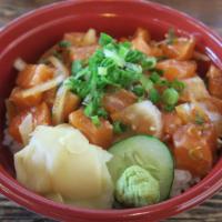 Salmon Poke Bowl · Salmon, white onions, green onions, masago (fish eggs), poke sauce, sesame seeds, ginger, wa...