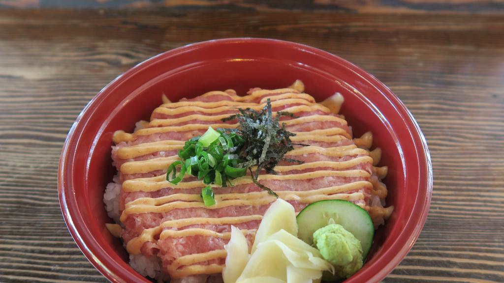 Spicy Ahi Bowl · Spicy ahi (ground tuna mixed with spicy mayonnaise), spicy mayonnaise, ginger, wasabi, nori (seaweed), green onions.