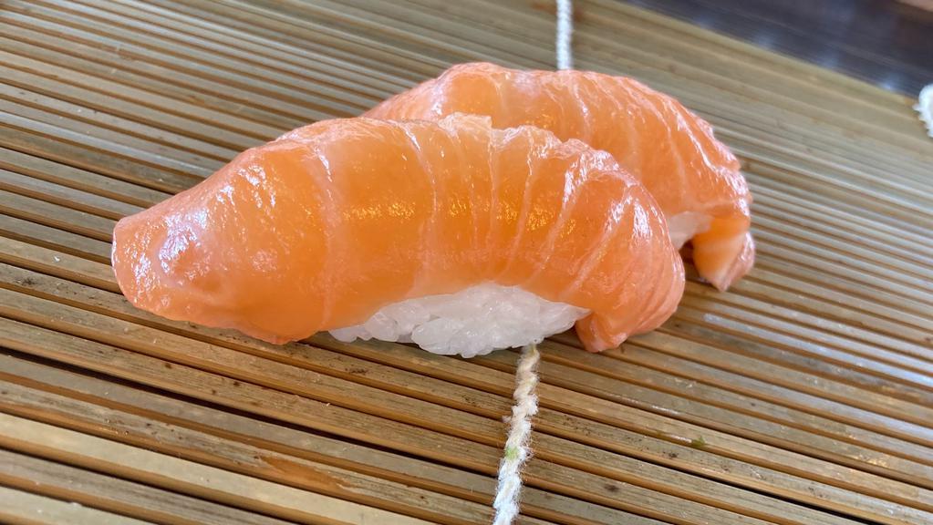 Salmon Nigiri · Two pieces of salmon nigiri.