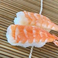 Ebi Nigiri · Two pieces of ebi (shrimp) nigiri.