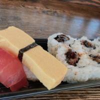 Kid'S Combo · Ahi (tuna) nigiri, tamago (egg) nigiri, unagi (eel) cucumber roll, nori (seaweed), sesame se...