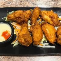 A14 Canh Ga Chien Nuoc Mam - Asian Chicken Wings · Crispy Chicken Wings in sweet and spicy fish sauce.