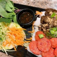 B18 Banh Hoi Thit Nuong & Nem Nuong · Rice vermicelli patties with grilled pork grilled meatball with fresh lettuce, top with peanut