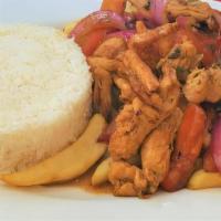 Lomo De Pollo / Sautéed Chicken Chunks With Tomatoes And Onions · 