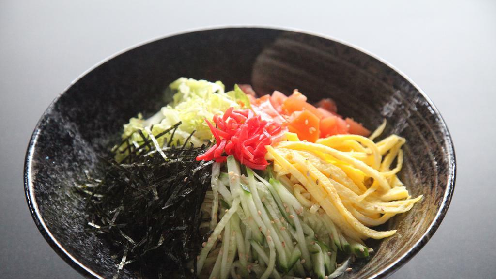 Veggie Hiyashi Chuka · Cold noodles topped with special soy sauce and vegetables. Topped with egg, cucumber, romaine, seaweed, tomato, ginger, and sesame seed.