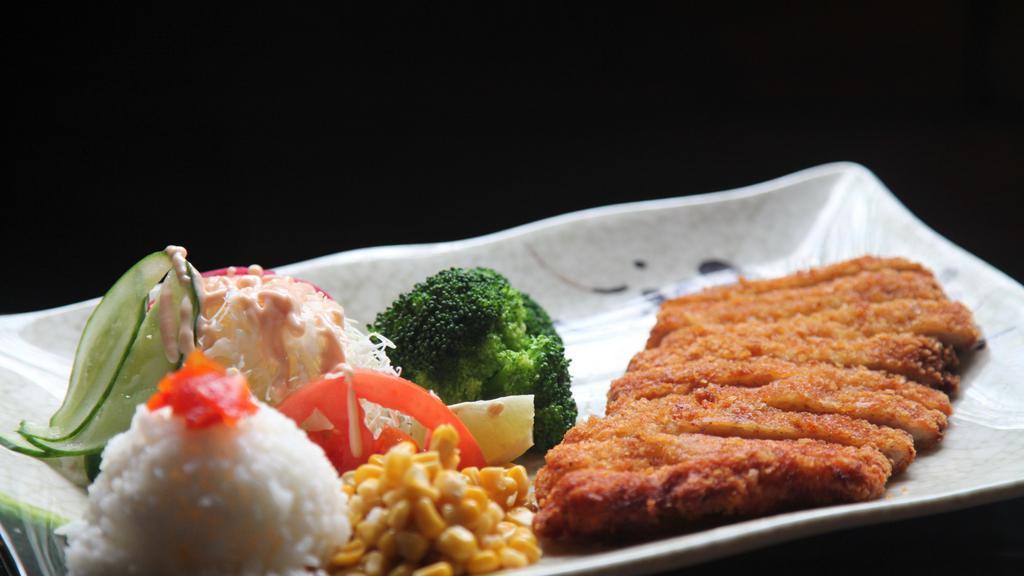 Katsu · Choice of breaded chicken or pork cutlet, served with rice, cabbage, corn, and broccoli.