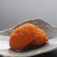 Potato Croquette (2Pc) · Breaded and fried potatoes.