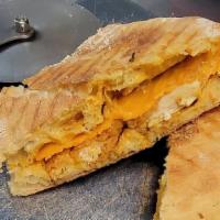 Bbq Chicken · Grilled chicken, golden bbq sauce, bacon, and cheddar, served on focaccia bread